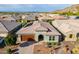 Charming single Gathering home with brick driveway, desert landscaping, and a two car garage at 10260 W Pinnacle Vista Dr, Peoria, AZ 85383