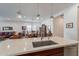 Stylish kitchen with center island that overlooks living and dining rooms at 10260 W Pinnacle Vista Dr, Peoria, AZ 85383