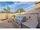 Outdoor kitchen featuring a built-in grill and counter space perfect for entertaining at 10260 W Pinnacle Vista Dr, Peoria, AZ 85383