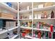Well-organized pantry with ample shelving for food storage and kitchen supplies at 10260 W Pinnacle Vista Dr, Peoria, AZ 85383