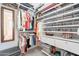 Spacious walk-in closet with custom shelving and ample storage space for clothes and accessories at 10260 W Pinnacle Vista Dr, Peoria, AZ 85383