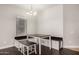 Dining area features a built in bench, table and a chandelier at 10835 W Saddlehorn Rd, Peoria, AZ 85383