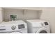 Bright laundry room with Samsung washer and dryer at 10835 W Saddlehorn Rd, Peoria, AZ 85383