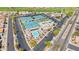 Sunland Springs Recreation area featuring multiple tennis courts, pool, clubhouse and parking lots at 10960 E Monte Ave # 169, Mesa, AZ 85209