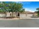 Charming single-story home with three-car garage and beautifully landscaped front yard at 10960 E Monte Ave # 169, Mesa, AZ 85209