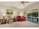 Bright living room with plush seating and sliding glass doors to the patio at 10960 E Monte Ave # 169, Mesa, AZ 85209