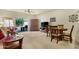 Comfortable living area with a ceiling fan and access to the patio at 10960 E Monte Ave # 169, Mesa, AZ 85209
