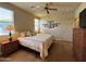 Inviting main bedroom featuring natural light, wood flooring and traditional decor at 10960 E Monte Ave # 169, Mesa, AZ 85209