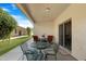 Inviting covered patio with seating, grill, and lush landscaping, creating an ideal space for relaxation and gatherings at 10960 E Monte Ave # 169, Mesa, AZ 85209