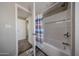 Bathroom featuring a tub-shower combo and a colorful shower curtain at 11275 N 99Th Ave # 170, Peoria, AZ 85345