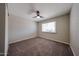 Neutral bedroom with a ceiling fan and natural light from the window at 11275 N 99Th Ave # 170, Peoria, AZ 85345