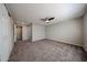 Large main bedroom featuring neutral walls, carpet, and a ceiling fan at 11275 N 99Th Ave # 170, Peoria, AZ 85345
