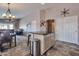 An open-concept kitchen connects to living area at 11540 W Sonoran Ct, Surprise, AZ 85378