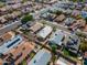 This aerial view showcases a vibrant neighborhood with well-maintained homes and landscaped yards at 11815 N 75Th Ln, Peoria, AZ 85345