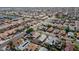 Aerial view of homes in a well-established neighborhood with mature trees and landscaping at 11815 N 75Th Ln, Peoria, AZ 85345