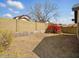 Fenced backyard with gravel and mature landscaping at 11815 N 75Th Ln, Peoria, AZ 85345