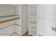 Bright walk-in closet featuring multiple levels of shelving and clothing racks at 11815 N 75Th Ln, Peoria, AZ 85345