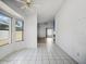 Open dining area featuring tiled floors and large windows offering natural light and scenic views at 11815 N 75Th Ln, Peoria, AZ 85345