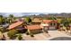 Desert homes featuring tile roofs, desert landscaping, and three car garages at 12436 S 38Th Pl, Phoenix, AZ 85044