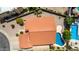 Aerial perspective reveals the home's terracotta roof, a backyard pool, and desert landscaping features at 12436 S 38Th Pl, Phoenix, AZ 85044