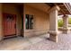 Inviting entryway showing the front door, stylish columns, and desert landscaping at 12436 S 38Th Pl, Phoenix, AZ 85044