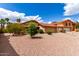 Charming single-story home featuring a red tile roof, neutral stucco, and low-maintenance landscaping at 12436 S 38Th Pl, Phoenix, AZ 85044