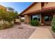 The property boasts attractive desert landscaping and a charming terracotta tiled roof at 12436 S 38Th Pl, Phoenix, AZ 85044