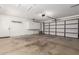 Spacious two car garage with storage shelving and ample room at 12436 S 38Th Pl, Phoenix, AZ 85044
