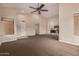 Spacious living room with high ceilings showing an open floor plan and neutral color palette at 12436 S 38Th Pl, Phoenix, AZ 85044