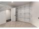 Spacious storage area features ample shelving and tile flooring for organized storage solutions at 12436 S 38Th Pl, Phoenix, AZ 85044