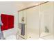 This bathroom features a glass enclosed shower with gray tile, and a toilet at 13300 E Via Linda -- # 1065, Scottsdale, AZ 85259