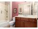 Bathroom with a shower-tub combo, a cherry wood vanity, and neutral walls at 13300 E Via Linda -- # 1065, Scottsdale, AZ 85259