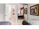 This bedroom has hardwood floors and a mirrored closet next to the doorway at 13300 E Via Linda -- # 1065, Scottsdale, AZ 85259