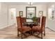 Stylish dining room area featuring a glass table, upholstered chairs, and modern decor at 13300 E Via Linda -- # 1065, Scottsdale, AZ 85259