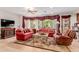 Spacious living room with classic decor, a ceiling fan, and great natural lighting at 13300 E Via Linda -- # 1065, Scottsdale, AZ 85259