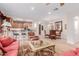Living room showcasing the dining and kitchen area, with natural light and hardwood floors at 13300 E Via Linda -- # 1065, Scottsdale, AZ 85259