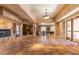 Large lounge area showcasing tile floors, fireplace, seating areas, and access to amenities at 13300 E Via Linda -- # 1065, Scottsdale, AZ 85259