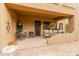 Inviting patio with varied seating options and desert landscaping at 13300 E Via Linda -- # 1065, Scottsdale, AZ 85259