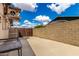 Private backyard with a simple concrete patio, and a well-maintained block wall at 1437 W Renee Dr, Phoenix, AZ 85027