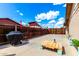 Spacious backyard features concrete, BBQ, and plenty of space for outdoor entertaining at 1437 W Renee Dr, Phoenix, AZ 85027
