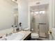 Bathroom featuring a vanity with sink, toilet, and enclosed shower at 1437 W Renee Dr, Phoenix, AZ 85027