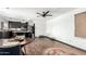 Open-concept layout featuring hardwood floors and a seamless flow to the kitchen at 1437 W Renee Dr, Phoenix, AZ 85027