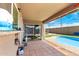 Covered patio with pool access, perfect for outdoor relaxation and entertainment by the pool at 1437 W Renee Dr, Phoenix, AZ 85027