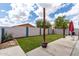 Inviting backyard with lush green grass, a patio, and privacy fence, perfect for outdoor enjoyment and relaxation at 1475 E Avenida Kino --, Casa Grande, AZ 85122