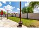 Serene backyard with a green lawn, defined patio space, and secure perimeter, ideal for enjoying the outdoors at 1475 E Avenida Kino --, Casa Grande, AZ 85122