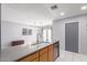 Modern kitchen island with gray countertop and stylish sink in a bright, open space at 1475 E Avenida Kino --, Casa Grande, AZ 85122