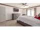 Comfortable main bedroom features wood-look floors and a gray dresser at 1475 E Avenida Kino --, Casa Grande, AZ 85122