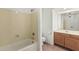 Bathroom featuring a bathtub, and vanity with a sink at 17943 N Woodrose Ave, Surprise, AZ 85374