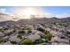 Overhead view capturing the layout of a neighborhood with mountain vistas, highlighting curb appeal and desert charm at 2040 E Indigo Brush Rd, Phoenix, AZ 85048