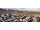 Aerial of a neighborhood with desert surroundings, displaying its layout and community feel at 2040 E Indigo Brush Rd, Phoenix, AZ 85048
